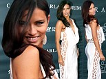 Angel in the Miami heat! Adriana Lima shows off her sideways allure in skin-revealing dress as she walks the red carpet at charity event