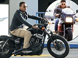 The need for speed! Tom Cruise�s son Connor apes his famous father's iconic Top Gun pose as he rides motorbike 