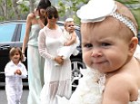 The family that dresses together, stays together! Kourtney Kardashian heads to church on Easter Sunday with Kendall, Mason and baby Penelope