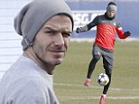Having a bad hair day? David Beckham keeps his locks hidden under grey beanie as he takes to the training grounds