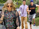A real Transformer! Josh Duhamel sweats it out at the gym before slipping on a shirt and tie to join pregnant wife Fergie at church