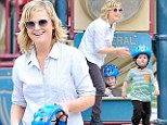 Recreation in the Park! Amy Poehler and her two sons spend a day in the park for some Easter fun and frivolity