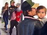Rested and rejuvenated: Miranda Kerr and doting father Orlando Bloom bring Flynn home from a family Easter break 