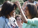 Straightening it out: It seemed to be Mrs Obama's bangs that were the problem 