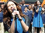 Blue belle Emmy Rossum helps swing a win for her home baseball team with a crowd-pleasing rendition of the national anthem