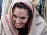 Charity: Angelina Jolie in Afghanistan, where she has funded a new primary school for girls