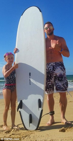 Nakita Wright while on holiday with her dad Russell in Portugal shortly before she was paralysed while learning to surf