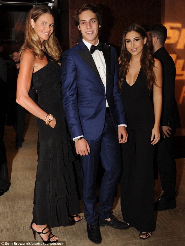 Family affair Elle was joined by son Arpad Busson, 18, and Camille Martayan