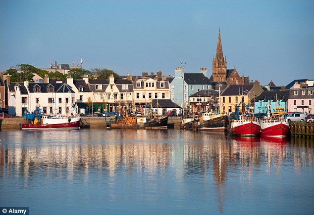 New figures from the Office for National Statistics (ONS) have deemed the Outer Hebrides the happiest (Pictured: Stornoway harbour, Isle of Lewis)