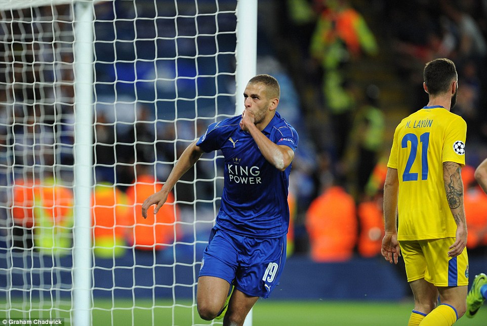 Leicester summer signing Islam Slimani wheels away after scoring the winner with a typically brave header