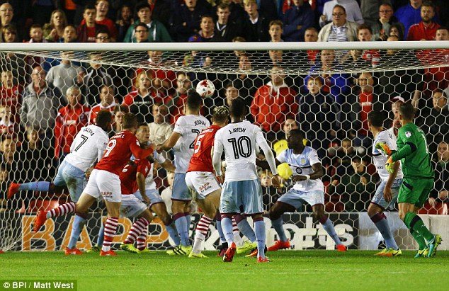 Winnall headers home Barnsley's equaliser in the 90th minute of the Championship game