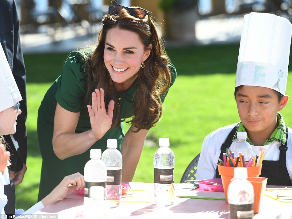 The Duchess of Cambridge speaks with local schoolchildren at a food and wine festival in British Columbia on Tuesday