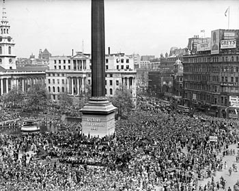 Crowds packed into Trafalgar Square to celebrate VE Day.Thousands of people crammed into London's Trafalgar Square to celebrate the allied victory. The base of Nelson's Column boasted the words 'Victory over Germany, 1945'